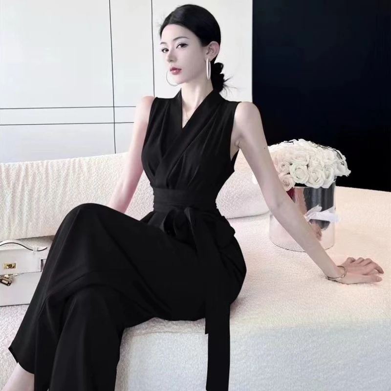 Женский комбинезон-ромпер в деловом стиле, элегантный, с завышенной талией, широкими штанинами, свободный, прямой крой, летний, из тонкой драпируемой ткани, повседневный
Женский комбинезон-ромпер в деловом стиле, элегантный, с завышенной талией, широкими штанинами, свободный, прямой крой, летний, из тонкой драпируемой ткани, повседневный