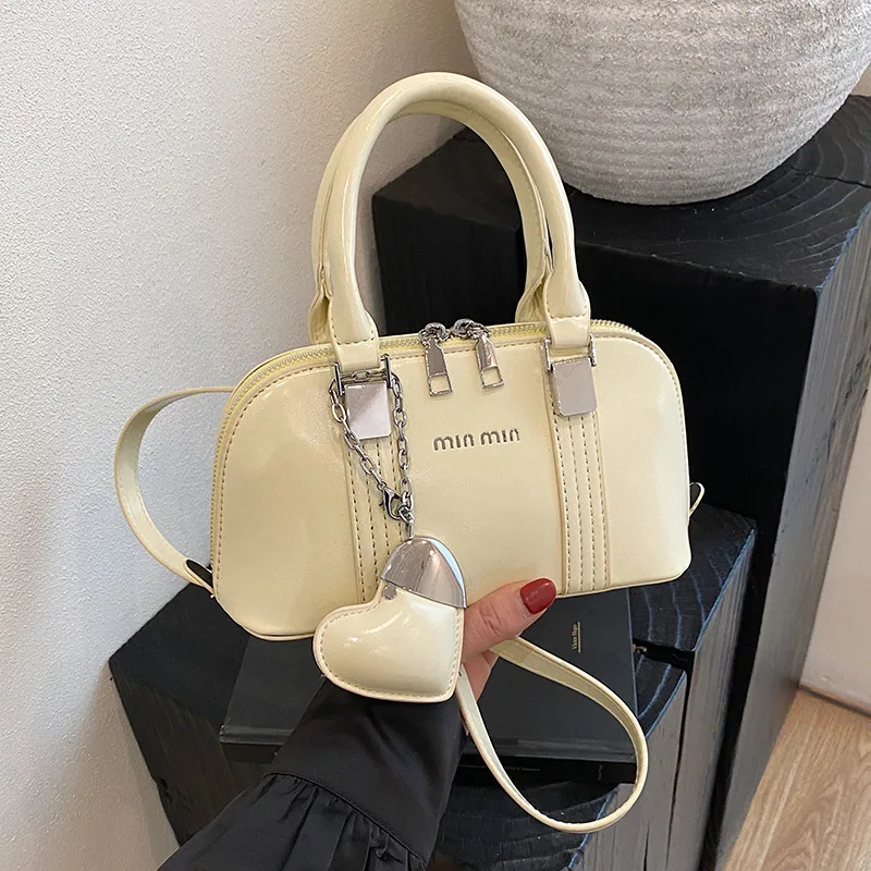 2023 Новая сумка через плечо Shell — модная женская сумка для боулинга, универсальная сумка через плечо, стильная и высококачественная элегантная
2023 Новая сумка через плечо Shell — модная женская сумка для боулинга, универсальная сумка через плечо, стильная и высококачественная элегантная