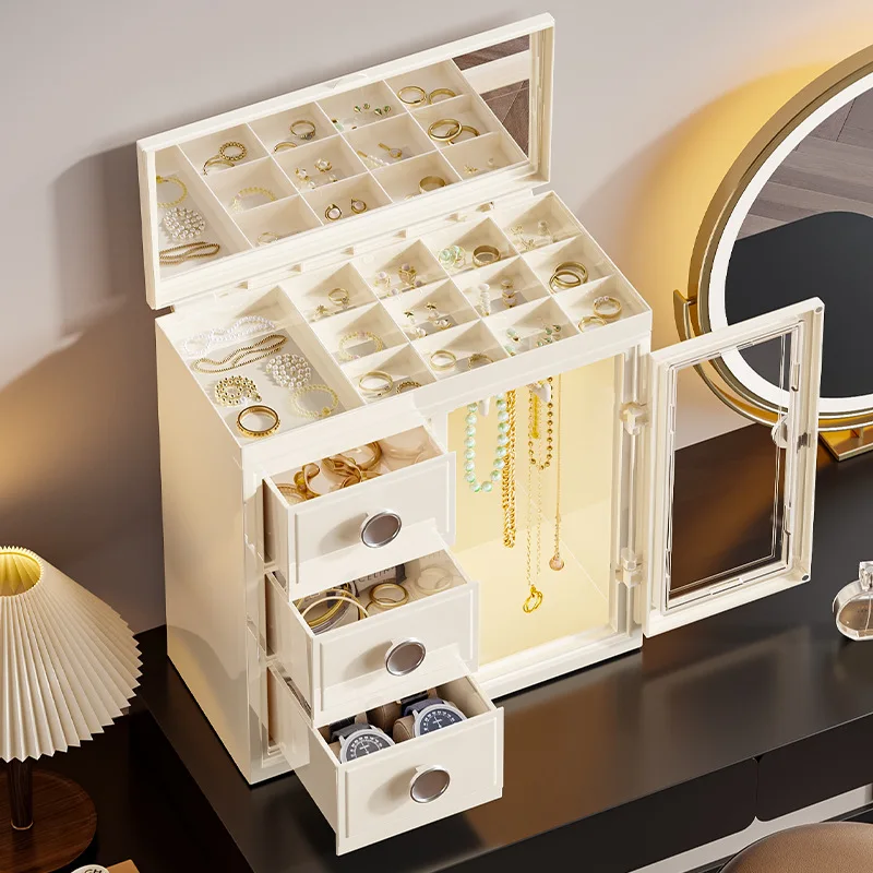 Ящик для хранения ювелирных изделий, органайзер для макияжа большой емкости с зеркалом, серьгами, кольцом, ожерельем, пыленепроницаемый ящик для хранения, настольный органайзер
Ящик для хранения ювелирных изделий, органайзер для макияжа большой емкости с зеркалом, серьгами, кольцом, ожерельем, пыленепроницаемый ящик для хранения, настольный органайзер