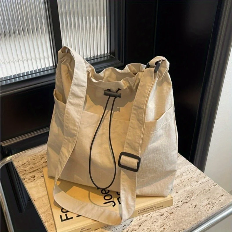 Fashionable Fabric Large Capacity Tote Bag for School & Commuting, Versatile Single Shoulder & Crossbody Bag
Fashionable Fabric Large Capacity Tote Bag for School & Commuting, Versatile Single Shoulder & Crossbody Bag