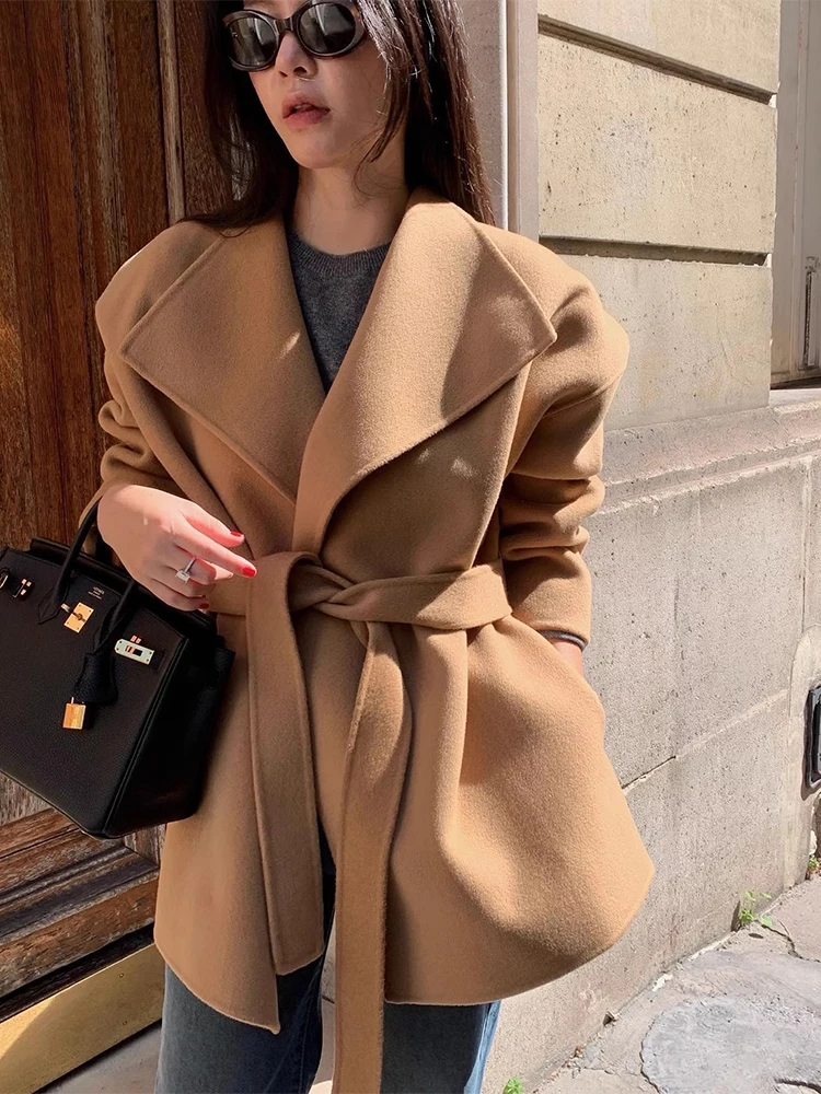 Clothland Women Chic Sashes Woolen Jacket Rope Long Sleeve Belt Loose Style Female Casual Fashion Coats Top CB172
Clothland Women Chic Sashes Woolen Jacket Rope Long Sleeve Belt Loose Style Female Casual Fashion Coats Top CB172