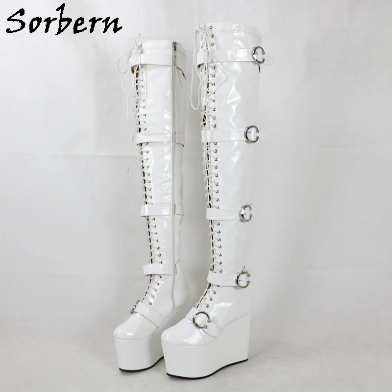 Белые блестящие высокие сапоги Sorbern для женщин, высокие сапоги до бедра на танкетке со шнуровкой и застежкой-молнией с несколькими ремнями и пряжками в промежности
Белые блестящие высокие сапоги Sorbern для женщин, высокие сапоги до бедра на танкетке со шнуровкой и застежкой-молнией с несколькими ремнями и пряжками в промежности