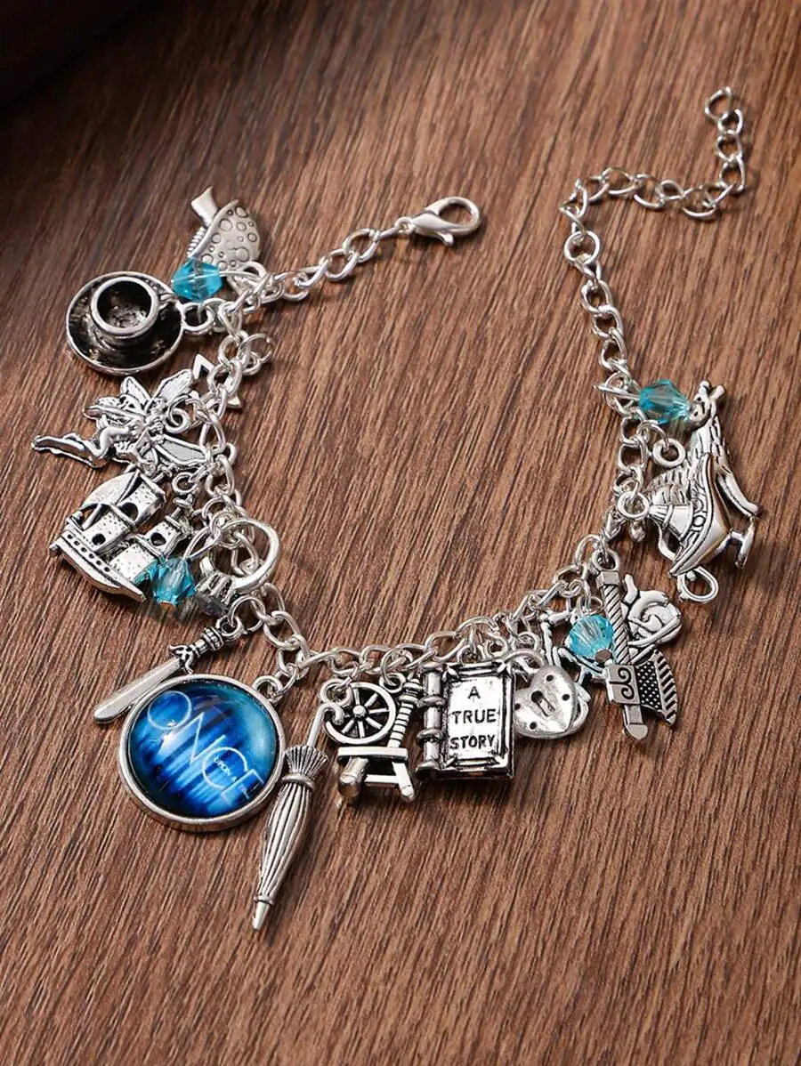 Fantasy Theme Charm Bracelet With Blue Crystal Accents For Everyday Wear
Fantasy Theme Charm Bracelet With Blue Crystal Accents For Everyday Wear