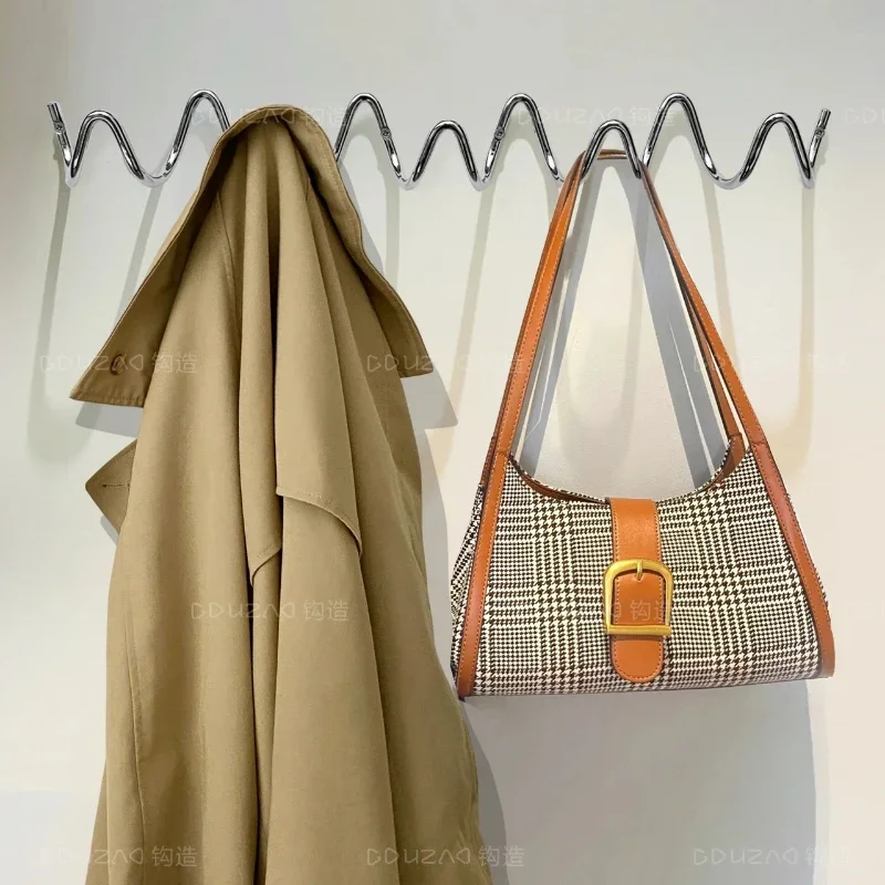 Высококачественный серебряный настенный крючок Bauhaus Ins Style, подвесная вешалка с волнами, идеально подходящая для входной стены, сумки и держателя одежды
Высококачественный серебряный настенный крючок Bauhaus Ins Style, подвесная вешалка с волнами, идеально подходящая для входной стены, сумки и держателя одежды