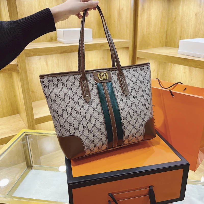 2026Summer high-end new women's bag, fashionable large-capacity printed shoulder handbag, versatile tote bag
2026Summer high-end new women's bag, fashionable large-capacity printed shoulder handbag, versatile tote bag
