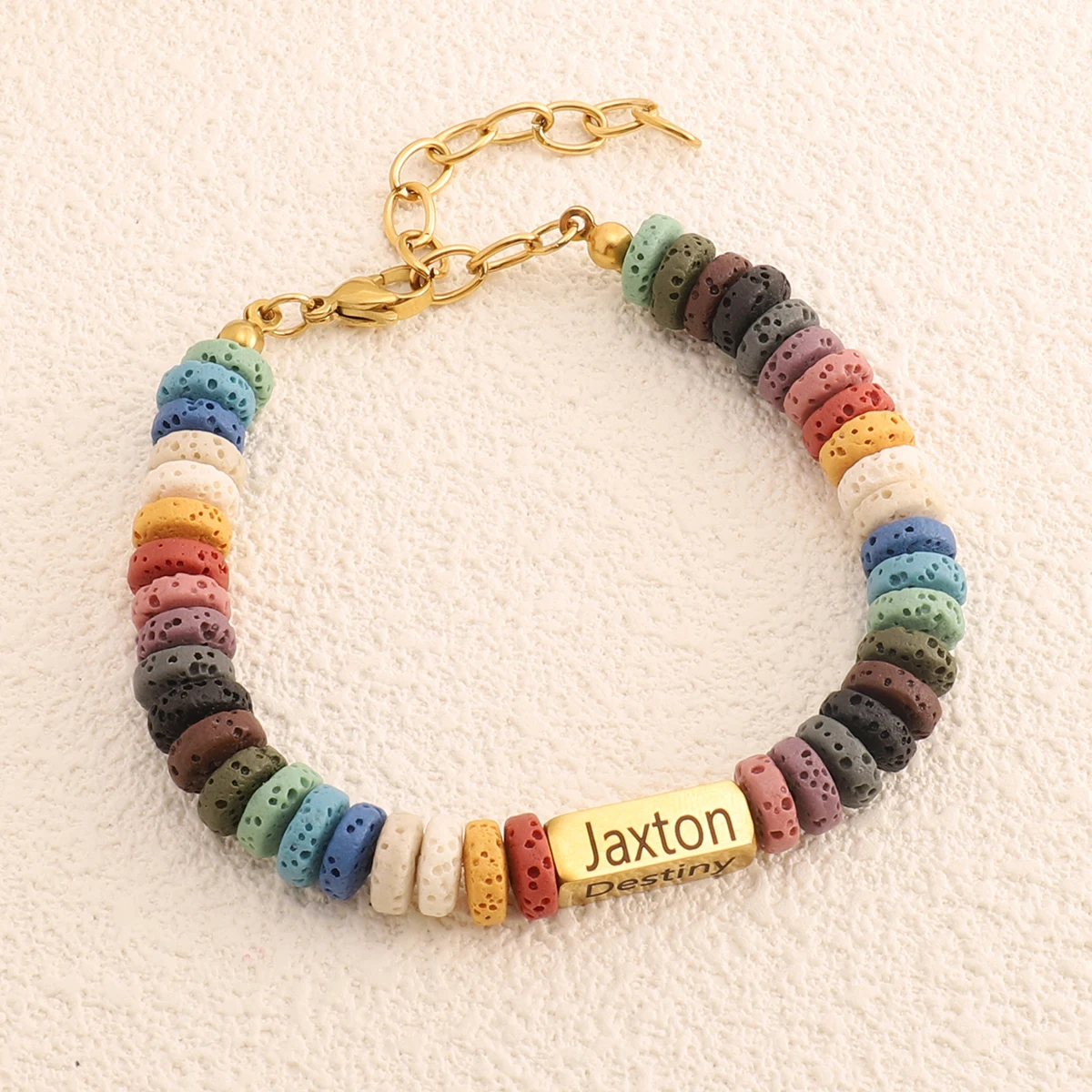 Fashion Colorful Volcanic Stone Bracelet 18K Gold Plated Stainless Steel Carved Name Bracelets for Women and Men
Fashion Colorful Volcanic Stone Bracelet 18K Gold Plated Stainless Steel Carved Name Bracelets for Women and Men