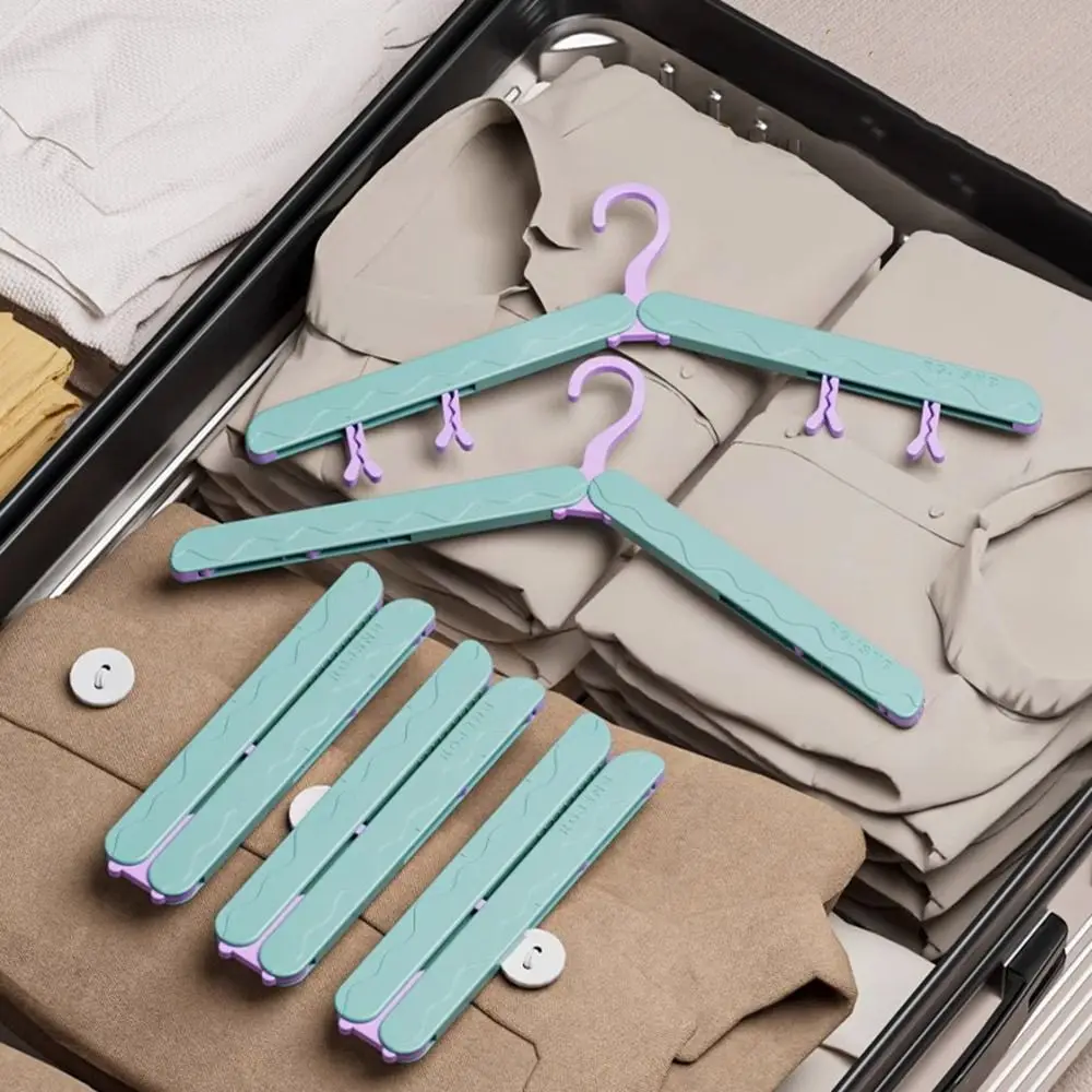 6Pcs Anti-Slip Foldable Travel Hangers Space Saving Lightweight Clothing Storage Hangers Plastic with Clips
6Pcs Anti-Slip Foldable Travel Hangers Space Saving Lightweight Clothing Storage Hangers Plastic with Clips