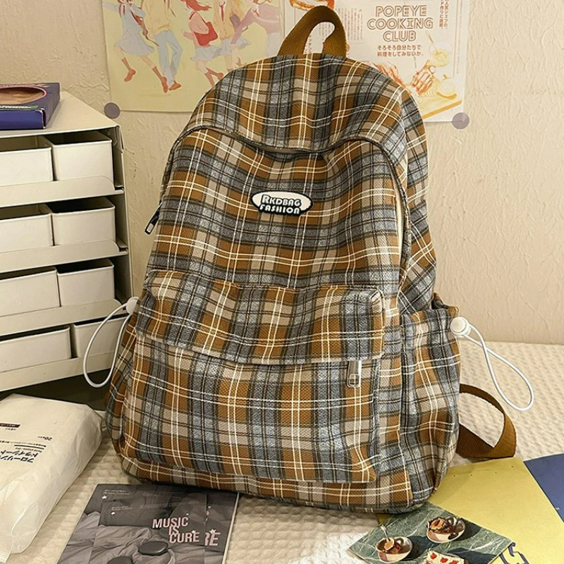 Новый простой рюкзак с клетчатой текстурой, универсальная школьная сумка большой емкости, модный повседневный и дорожный рюкзак для женщин и мужчин
Новый простой рюкзак с клетчатой текстурой, универсальная школьная сумка большой емкости, модный повседневный и дорожный рюкзак для женщин и мужчин