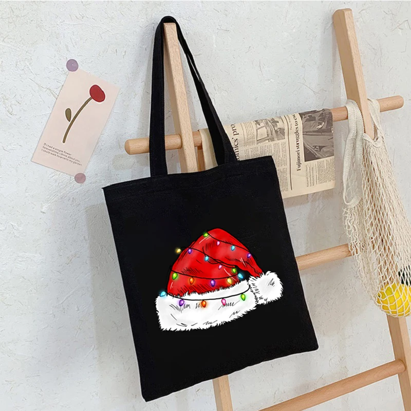 Christmas Hat Canvas Shopping Bag Portable Shoulder Bags Trendy Large Tote Bags for Daily Life Women Large Capacity Shopping Bag
Christmas Hat Canvas Shopping Bag Portable Shoulder Bags Trendy Large Tote Bags for Daily Life Women Large Capacity Shopping Bag