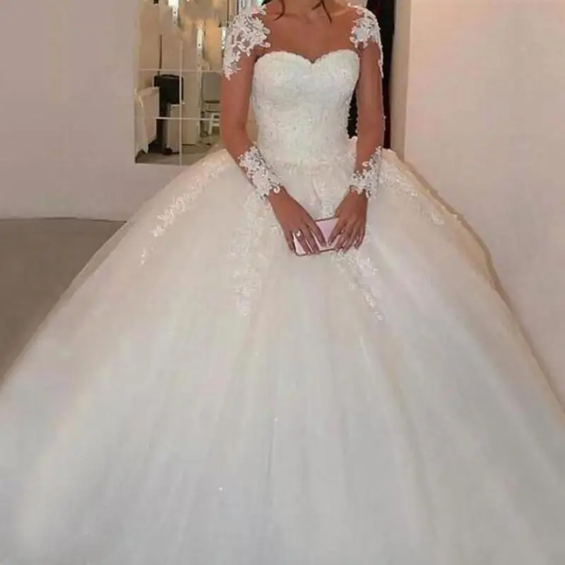 New Elegant Sweetheart Skin color Tulle Pluse Size Long Sleeve Wedding Dress O Neck Applique Lace Bridal Gown Vestido De Noiva
New Elegant Sweetheart Skin color Tulle Pluse Size Long Sleeve Wedding Dress O Neck Applique Lace Bridal Gown Vestido De Noiva