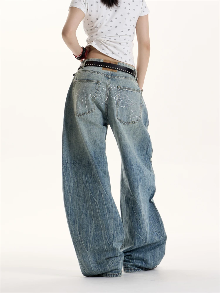 Retro American Street Washed Crack Letter Rhinestone Jeans Loose Straight Leg Slimming Floor-Length Jeans for Men And Women
Retro American Street Washed Crack Letter Rhinestone Jeans Loose Straight Leg Slimming Floor-Length Jeans for Men And Women