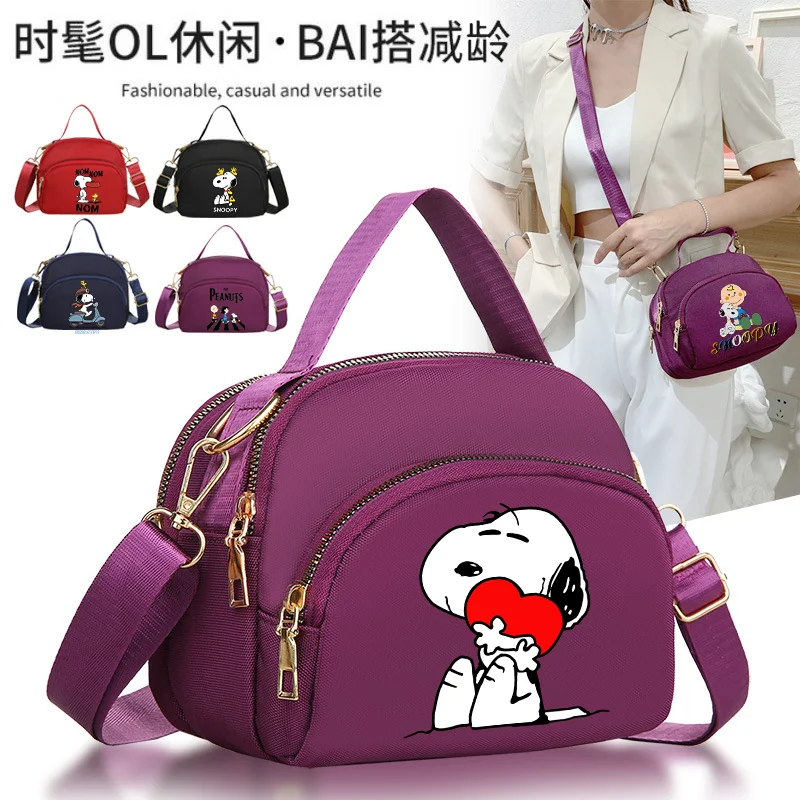 Сумка на плечо Snoopy с мультяшным аниме, миниатюрная тканевая Повседневная нейлоновая Женская сумочка через плечо с карманами, простой кошелек для мелочи
Сумка на плечо Snoopy с мультяшным аниме, миниатюрная тканевая Повседневная нейлоновая Женская сумочка через плечо с карманами, простой кошелек для мелочи