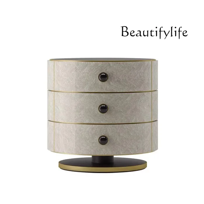 Italian high-end light luxury bedside table round simple modern designer creative bedside table creative locker
Italian high-end light luxury bedside table round simple modern designer creative bedside table creative locker
