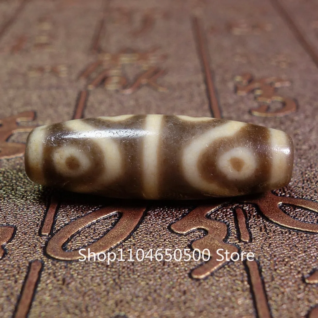 High oil tooth yellow water pattern eight eyes dzi beads Le bead Buddha Nianduobao bracelet chain pendant chain bead handle 12 *
High oil tooth yellow water pattern eight eyes dzi beads Le bead Buddha Nianduobao bracelet chain pendant chain bead handle 12 *