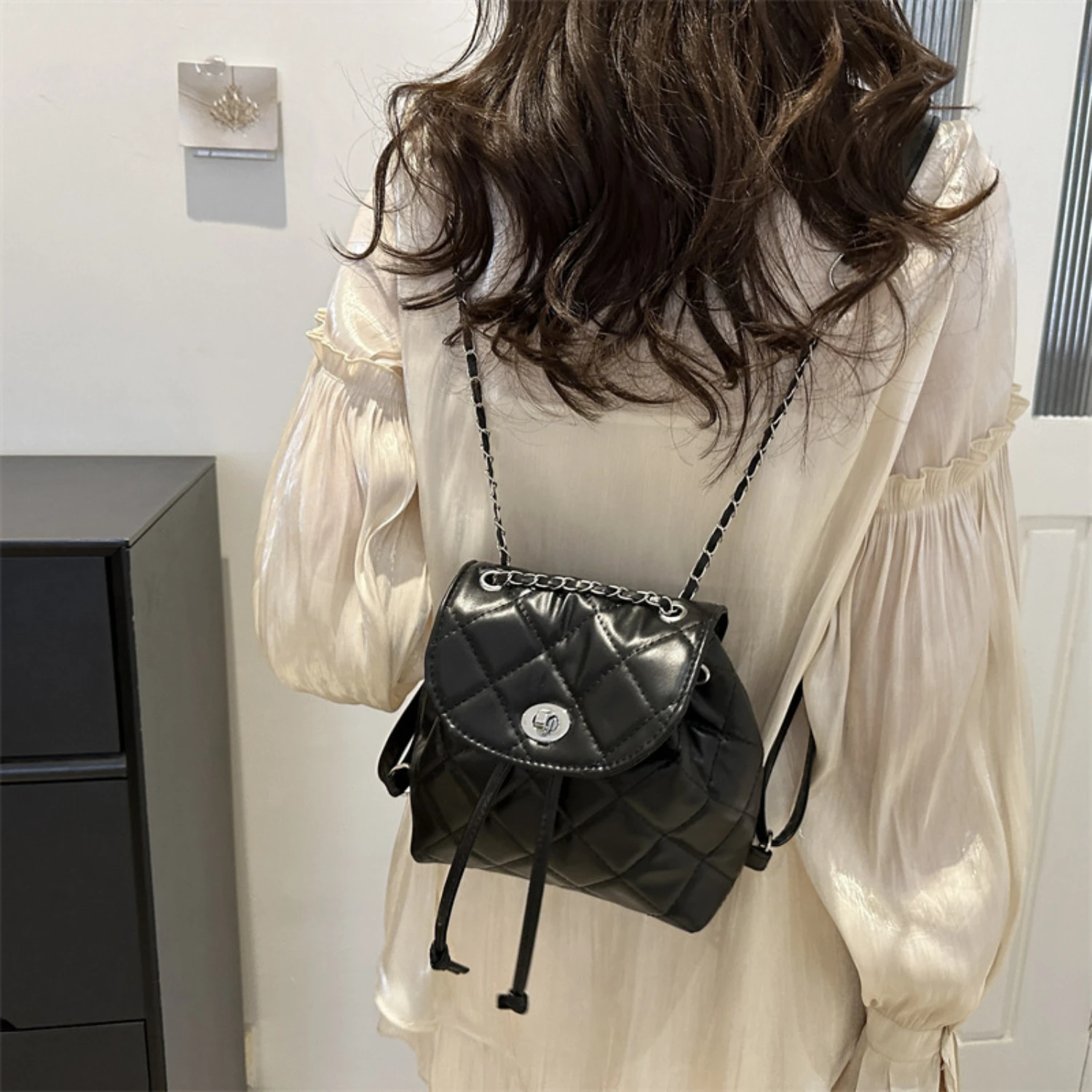 Mini Fashion Backpack, Quilted PU Leather, Chain Strap, Drawstring - Women's Elegant ClassicAccessType: Backpack. Features: Quil
Mini Fashion Backpack, Quilted PU Leather, Chain Strap, Drawstring - Women's Elegant ClassicAccessType: Backpack. Features: Quil