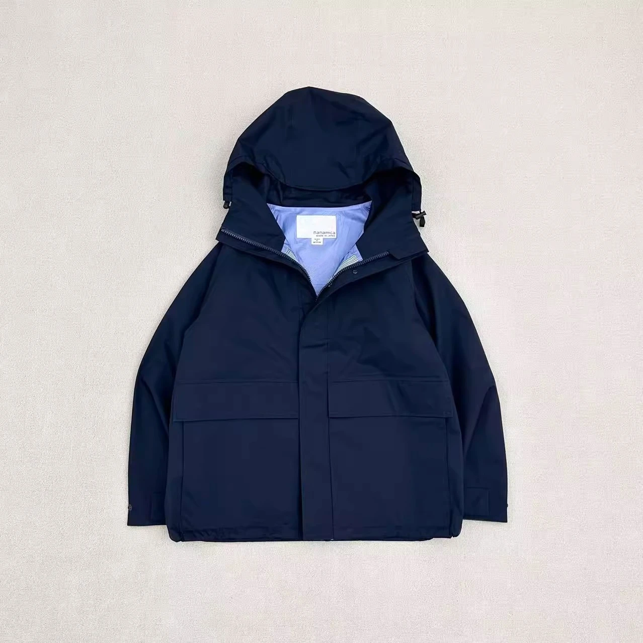 NANAMICA TEX 3L Cruiser wasserdichte winddichte Jacke
NANAMICA TEX 3L Cruiser wasserdichte winddichte Jacke