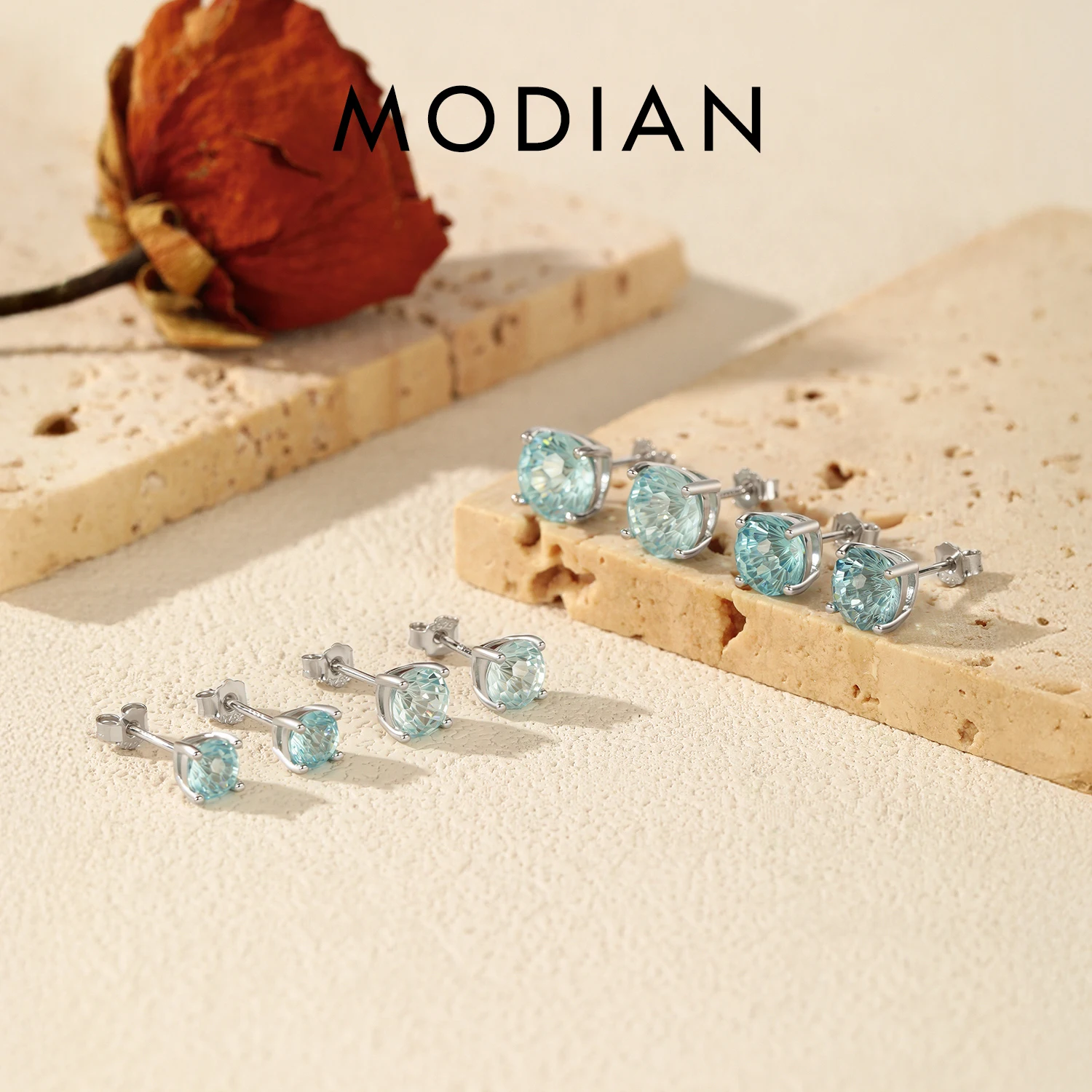 MODIAN 925 Sterling Silver Unisex Light Blue Firework Cut Zirconia Round Studs Earrings For Women And Men Fine Jewelry
MODIAN 925 Sterling Silver Unisex Light Blue Firework Cut Zirconia Round Studs Earrings For Women And Men Fine Jewelry