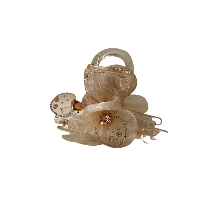 Grab clip women's model, high-end champagne flower half-tied hair, hairpin headgear on the back of the head
Grab clip women's model, high-end champagne flower half-tied hair, hairpin headgear on the back of the head