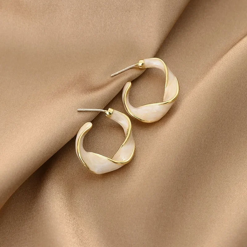 Korean Simple Fashion Design Drop Glaze Distort Twist Hoop Earrings for Women Party Birthday Custom Jewelry
Korean Simple Fashion Design Drop Glaze Distort Twist Hoop Earrings for Women Party Birthday Custom Jewelry