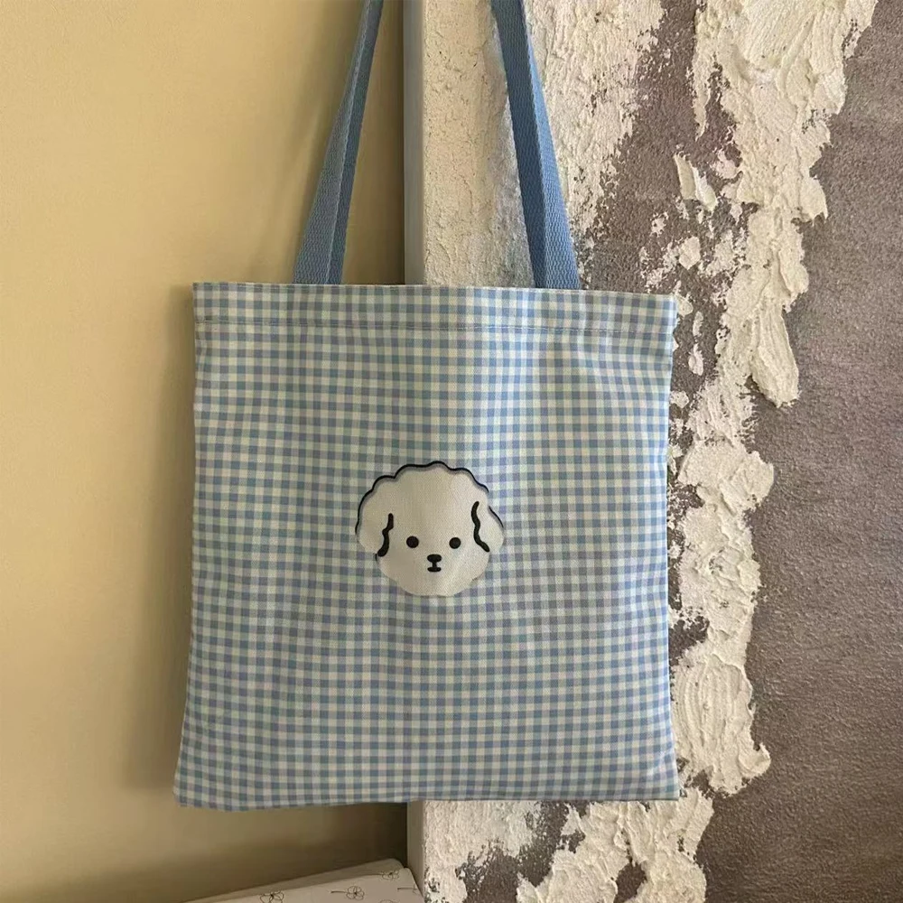 Blue Plaid Canvas Tote Bag with a Cute Puppy Design, Sweet and Adorable Student Tutoring Bag, Lightweight and Fresh Style Shoulder Bag for Outings
Blue Plaid Canvas Tote Bag with a Cute Puppy Design, Sweet and Adorable Student Tutoring Bag, Lightweight and Fresh Style Shoulder Bag for Outings