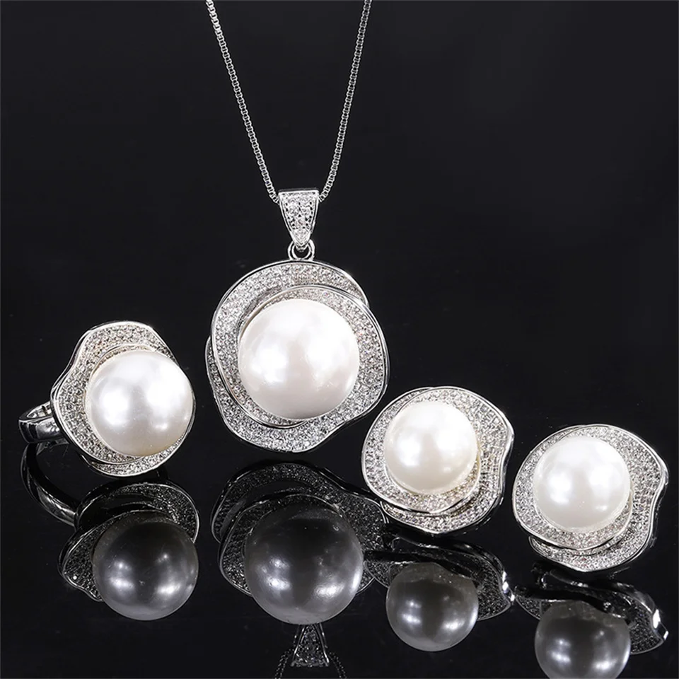 White Shell Bead Rose Geometric Diamond Ring Pendant Earring Set Jewelry Gifts Light Luxury White Pearl Stainless Steel Jewelry 
White Shell Bead Rose Geometric Diamond Ring Pendant Earring Set Jewelry Gifts Light Luxury White Pearl Stainless Steel Jewelry
