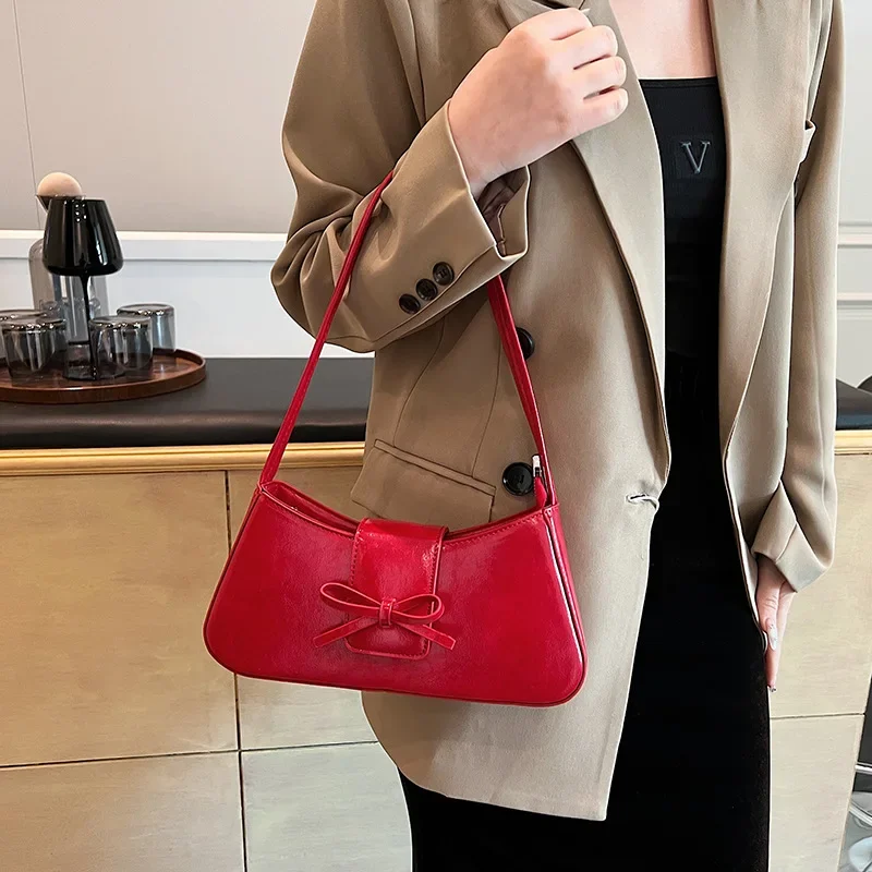 Korean fashion niche bow tie stick bag for women 2025 new handbag trend versatile single shoulder crossbody bag
Korean fashion niche bow tie stick bag for women 2025 new handbag trend versatile single shoulder crossbody bag