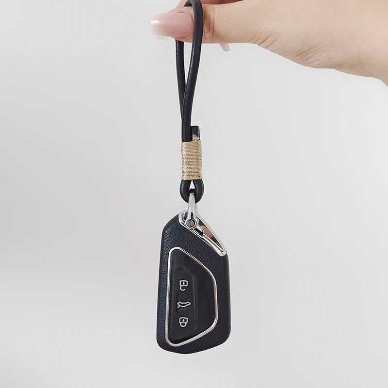 Suitable for Volkswagen Tharu Tiguan Teramont T-ROC Tavendor TPU + Leather Car Remote Key Case Cover Simple Style
Suitable for Volkswagen Tharu Tiguan Teramont T-ROC Tavendor TPU + Leather Car Remote Key Case Cover Simple Style