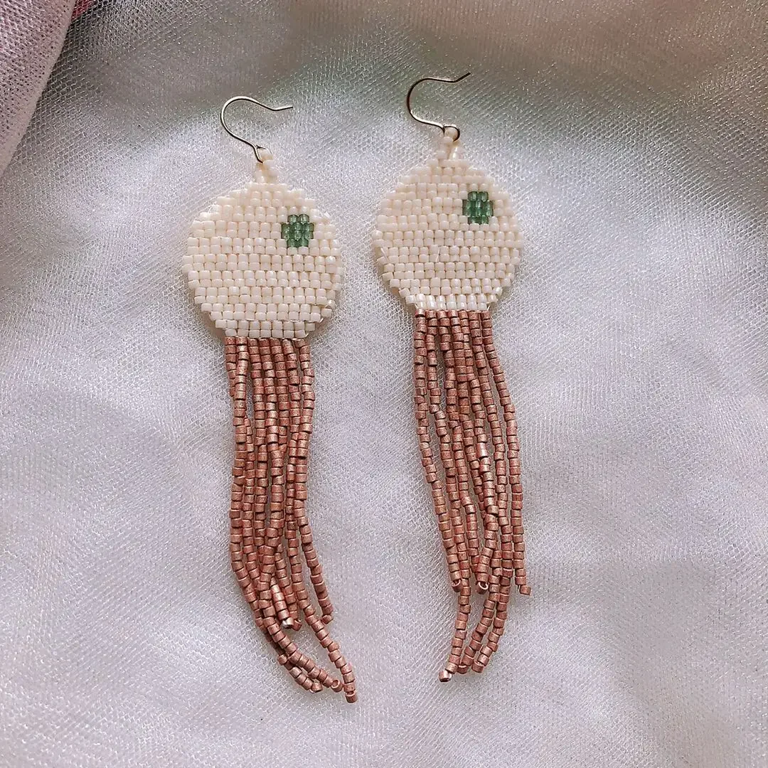ZGMXR Bohemia Alloy Tassel Earrings with round Beads Hand Knitted Fashion Female Simple Design Rice Bead Earrings
ZGMXR Bohemia Alloy Tassel Earrings with round Beads Hand Knitted Fashion Female Simple Design Rice Bead Earrings
