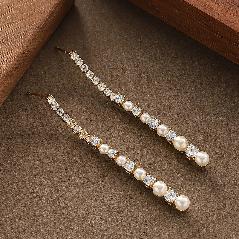 Super fairy and sweet temperament, fairy style diamond-encrusted pearl tassel earrings, light luxury and high-end earrings
Super fairy and sweet temperament, fairy style diamond-encrusted pearl tassel earrings, light luxury and high-end earrings
