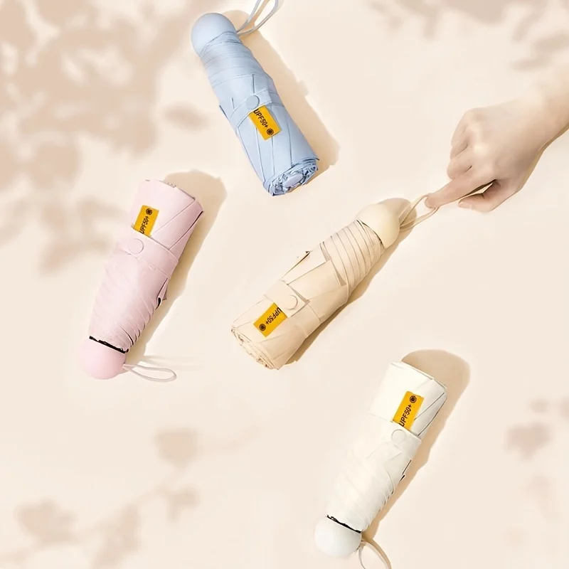 1pc Compact UPF 50+ Mini Portable Sun Umbrella With UV Protection, 5-Fold Capsule Simple Casual Style Sun And Rain Dual-use Umbr
1pc Compact UPF 50+ Mini Portable Sun Umbrella With UV Protection, 5-Fold Capsule Simple Casual Style Sun And Rain Dual-use Umbr