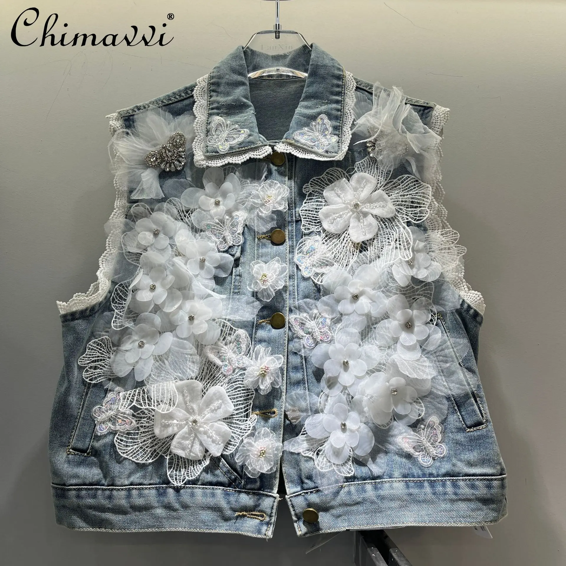 2026 Spring Summer New Heavy 3d Appliqué Floral Rhinestone Sleeveless Denim Vest Jacket Coat Fashion Women's Streetwear Top
2026 Spring Summer New Heavy 3d Appliqué Floral Rhinestone Sleeveless Denim Vest Jacket Coat Fashion Women's Streetwear Top