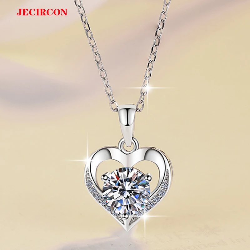 JECIRCON S925 ожерелье из стерлингового серебра женское в форме сердца 1/2 карата кулон с муассанитом корейская версия модная цепочка на ключицу
JECIRCON S925 ожерелье из стерлингового серебра женское в форме сердца 1/2 карата кулон с муассанитом корейская версия модная цепочка на ключицу