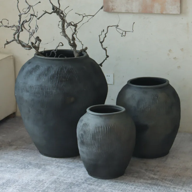 Spot retro black and gray pottery pot wabi sabi landscaping decorative garden Weng tank coarse pottery earth pottery floor round
Spot retro black and gray pottery pot wabi sabi landscaping decorative garden Weng tank coarse pottery earth pottery floor round