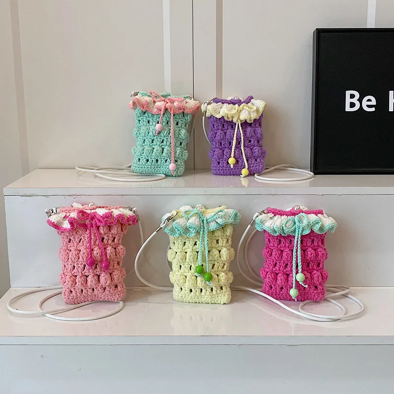 2025 Europe and America New Retro Trend Handwoven Shoulder Bag Fashion Wool Mobile Phone Bucket Messenger Bag for Women
2025 Europe and America New Retro Trend Handwoven Shoulder Bag Fashion Wool Mobile Phone Bucket Messenger Bag for Women