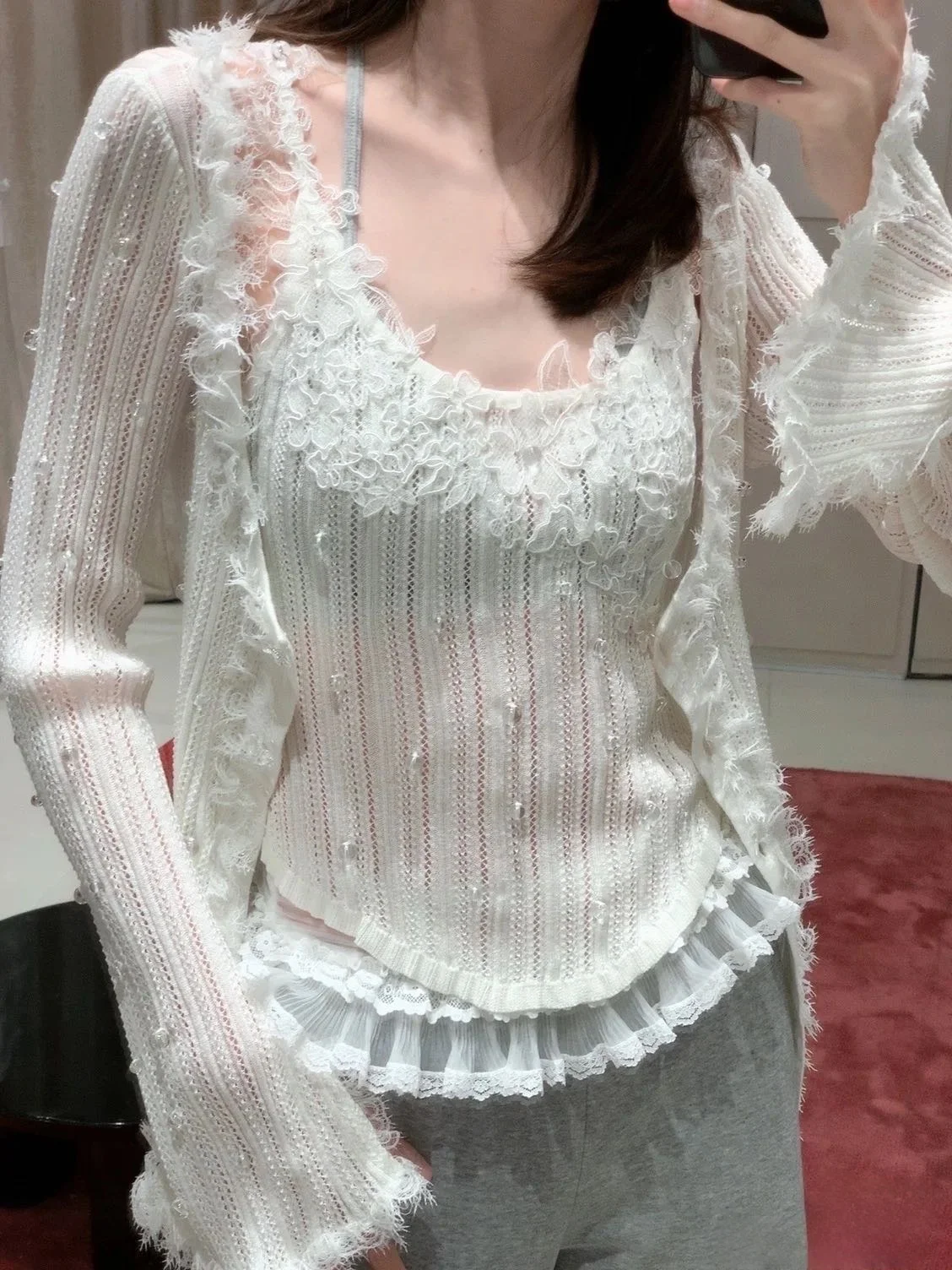 A two-piece set of three-dimensional lace patchwork fairy knitted sweater and strappy vest for Spring and autumn 2025 new style
A two-piece set of three-dimensional lace patchwork fairy knitted sweater and strappy vest for Spring and autumn 2025 new style