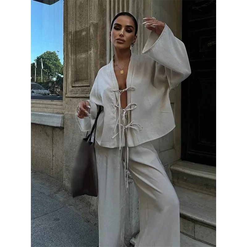 V Neck Hollow Out Lace Up Bow Shirt Set For Women Solid Causal Loose Wide Leg Pants Suits New Fashion Ladies High Street Outfits
V Neck Hollow Out Lace Up Bow Shirt Set For Women Solid Causal Loose Wide Leg Pants Suits New Fashion Ladies High Street Outfits