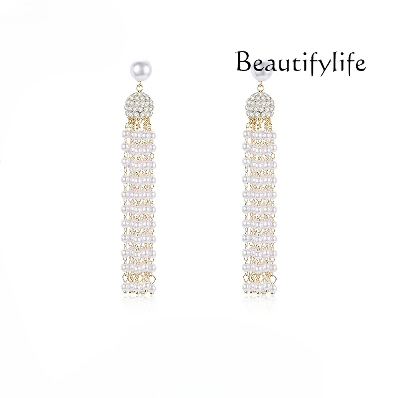 Tassel pearl earrings women's light luxury high-end long stud earrings design sense fashion earrings
Tassel pearl earrings women's light luxury high-end long stud earrings design sense fashion earrings