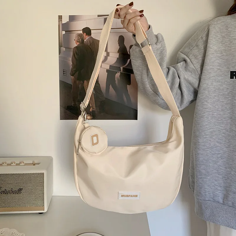 Crossbody Bag 2024 New Women Bag Fashion Large Capacity Bag Nylon Versatile White Y2K Hobos Bag Student Class Shoulder Bag
Crossbody Bag 2024 New Women Bag Fashion Large Capacity Bag Nylon Versatile White Y2K Hobos Bag Student Class Shoulder Bag