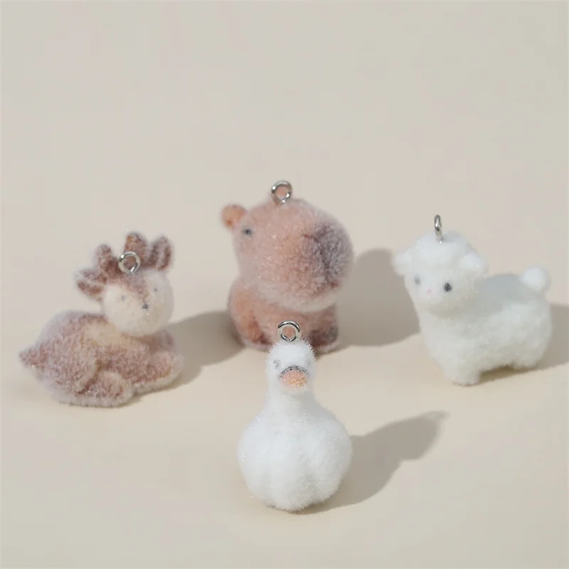 Winter style 40pcs/lot color flocking animals cartoon Deer sheep goose shape resin beads diy jewelry garment hair accessory
Winter style 40pcs/lot color flocking animals cartoon Deer sheep goose shape resin beads diy jewelry garment hair accessory