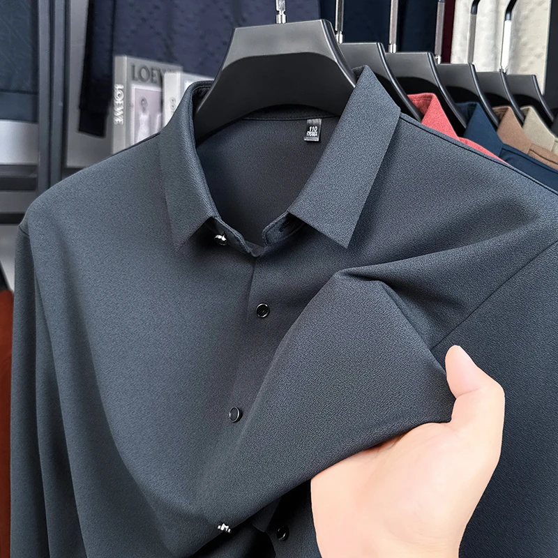 Мужская рубашка с длинным рукавом с лацканами и верхним дизайном, осенняя новинка, бесшовный однотонный топ, элитная деловая офисная повседневная мужская одежда
Мужская рубашка с длинным рукавом с лацканами и верхним дизайном, осенняя новинка, бесшовный однотонный топ, элитная деловая офисная повседневная мужская одежда