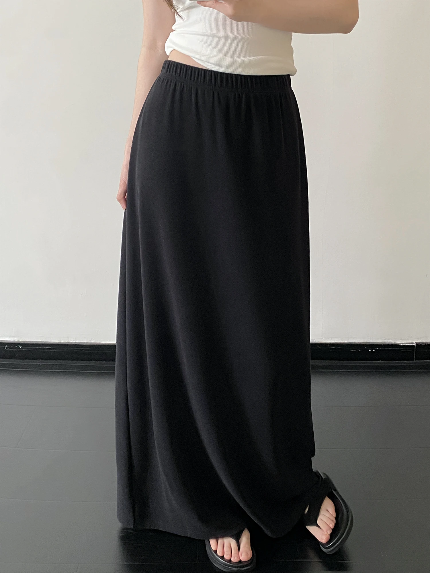 Юбка SunYeo Black Sugar Oats Lazy Long Skirt: минималистичная, свободного кроя, с высокой талией, прямого силуэта, для повседневной носки, женская мода
Юбка SunYeo Black Sugar Oats Lazy Long Skirt: минималистичная, свободного кроя, с высокой талией, прямого силуэта, для повседневной носки, женская мода