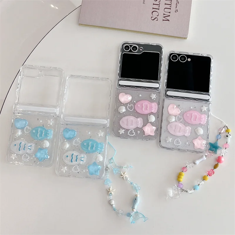 Clear Glitter Ocean Fish Phone Case With Beaded Lanyard For Samsung Galaxy Z Flip 5 6 7 Shockproof Cute Cover ZFlip5 ZFlip6 ZFli
Clear Glitter Ocean Fish Phone Case With Beaded Lanyard For Samsung Galaxy Z Flip 5 6 7 Shockproof Cute Cover ZFlip5 ZFlip6 ZFli