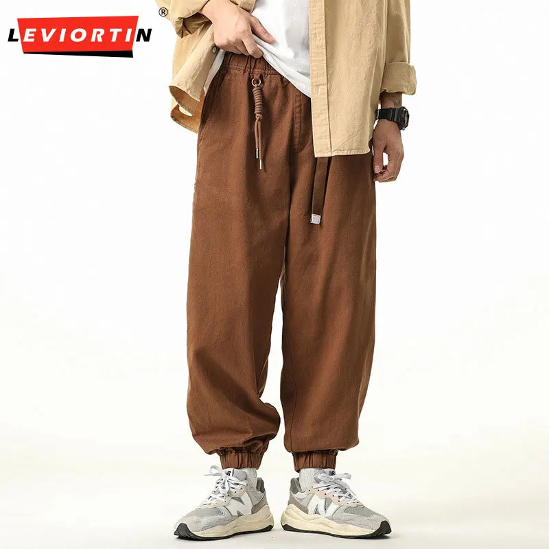 Мужские повседневные однотонные широкие брюки до щиколотки в японском стиле ретро, осень/зима 2021, простой свободный дизайн с задним карманом
Мужские повседневные однотонные широкие брюки до щиколотки в японском стиле ретро, осень/зима 2021, простой свободный дизайн с задним карманом