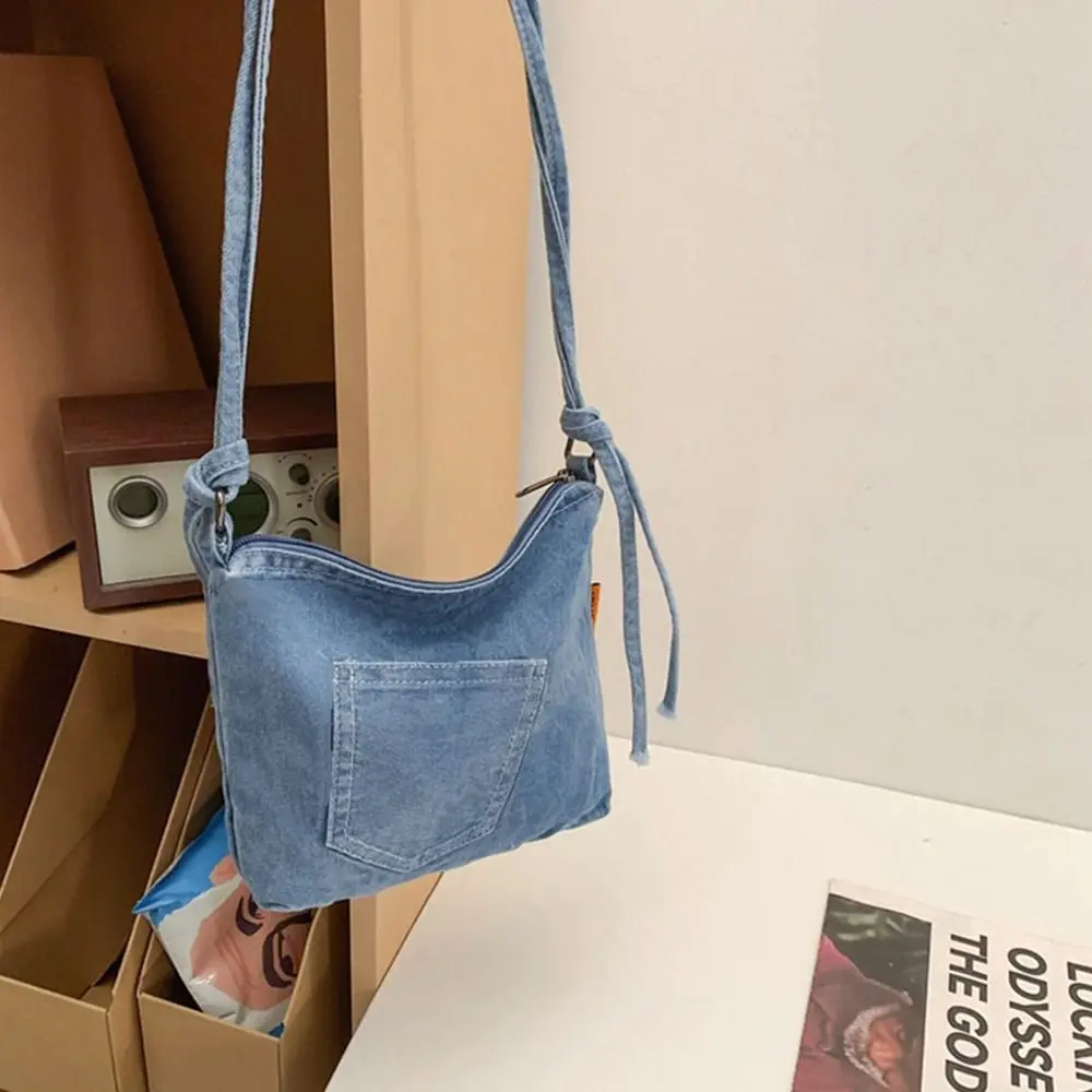 Повседневная джинсовая сумка Y2K из канваса, большая вместительная сумка в уличном стиле, винтажная сумка-тоут, однотонная сумка через плечо для девушек
Повседневная джинсовая сумка Y2K из канваса, большая вместительная сумка в уличном стиле, винтажная сумка-тоут, однотонная сумка через плечо для девушек