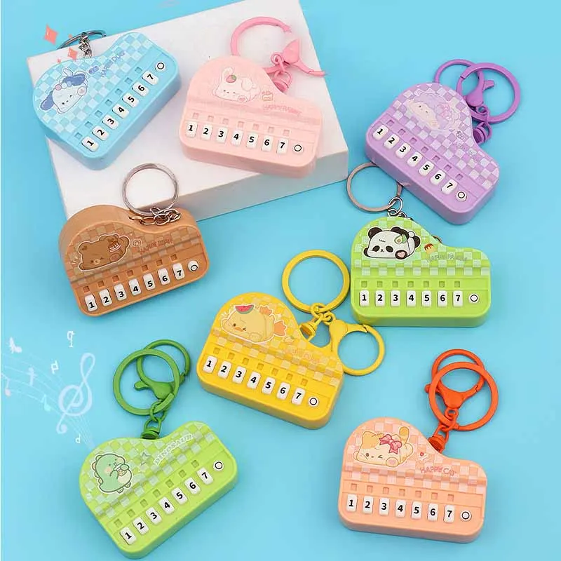 Creative Mini Cartoon Cute Piano Keychain Pendant Handheld Game Machine With Lights Music Simulation Electronic Piano Toy Gifts
Creative Mini Cartoon Cute Piano Keychain Pendant Handheld Game Machine With Lights Music Simulation Electronic Piano Toy Gifts