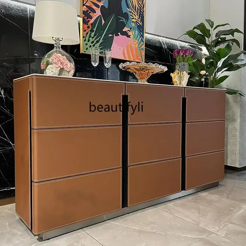Light luxury saddle leather, entrance cabinet, side cabinet, rock slab locker, living room storage against the wall
Light luxury saddle leather, entrance cabinet, side cabinet, rock slab locker, living room storage against the wall
