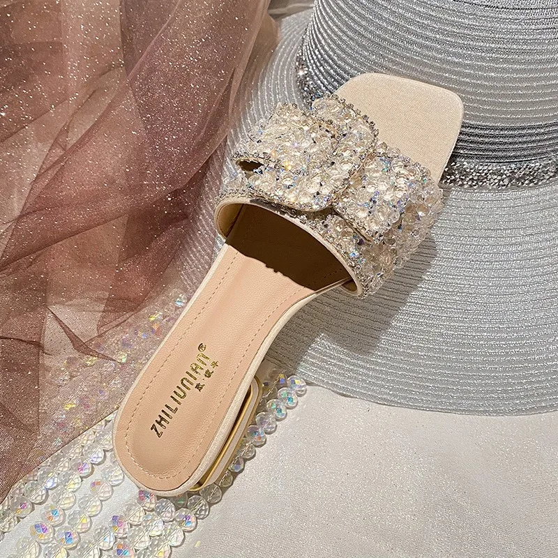 Rhinestone one-word drag 2025 new summer thick heel cool slippers women's summer wear fashion flat bottom out women's shoes drag
Rhinestone one-word drag 2025 new summer thick heel cool slippers women's summer wear fashion flat bottom out women's shoes drag