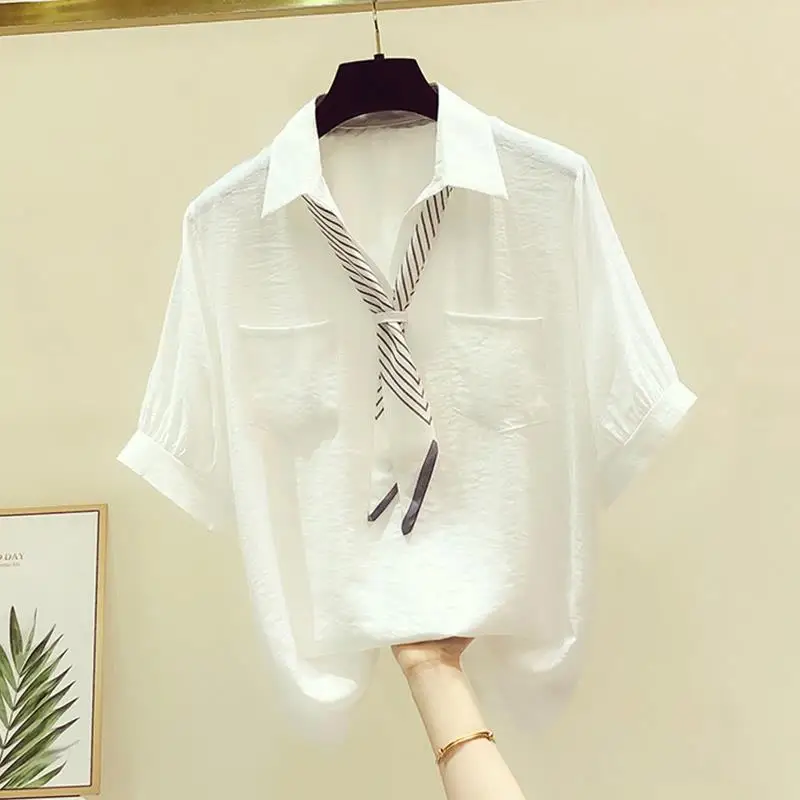 Тонкая женская шифоновая рубашка с короткими рукавами
Тонкая женская шифоновая рубашка с короткими рукавами