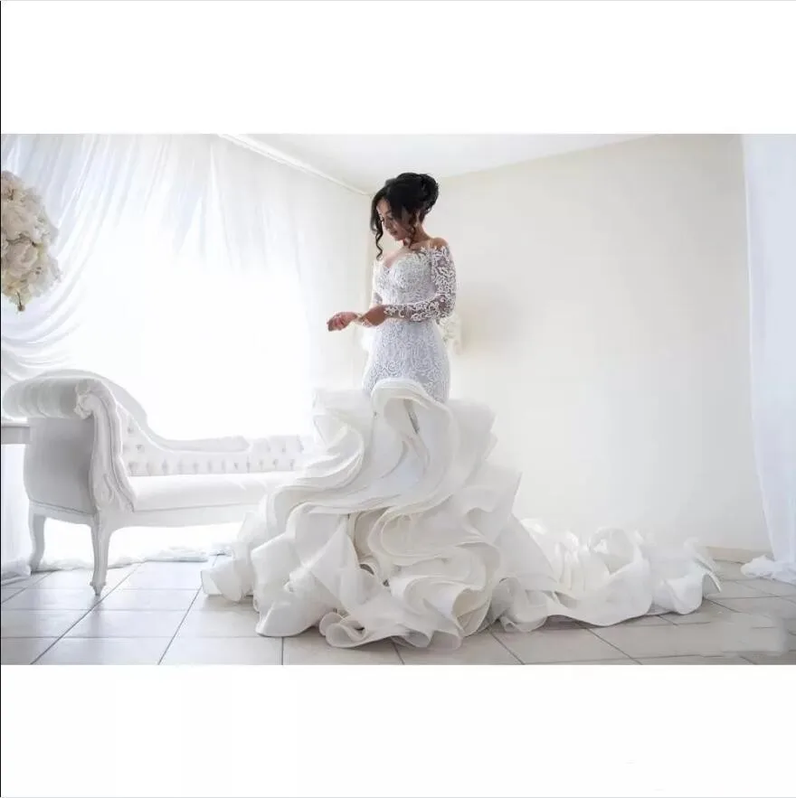 Charming Mermaid Wedding Dresses Lace Long Sleeves Muslim Vestido De Noiva Romantic Appliques Ruffles Skirt Bridal Gowns Button
Charming Mermaid Wedding Dresses Lace Long Sleeves Muslim Vestido De Noiva Romantic Appliques Ruffles Skirt Bridal Gowns Button
