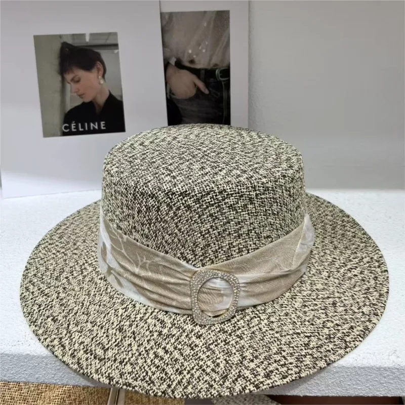 A large-brim woven ribbon flat-topped hat for children's seaside vacation and shade
A large-brim woven ribbon flat-topped hat for children's seaside vacation and shade